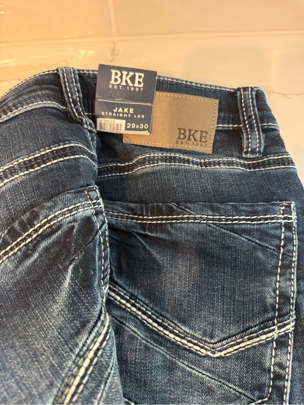 BKE Jake Straight Leg Jeans in dark blue with contrast white stitching